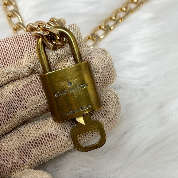 082 Pre Owned Authentic Louis Vuitton Gold Tone  Padlock & Key - Picture 2 of 4